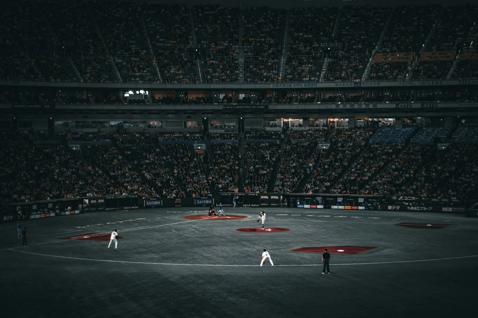 Baseball players on field during a game