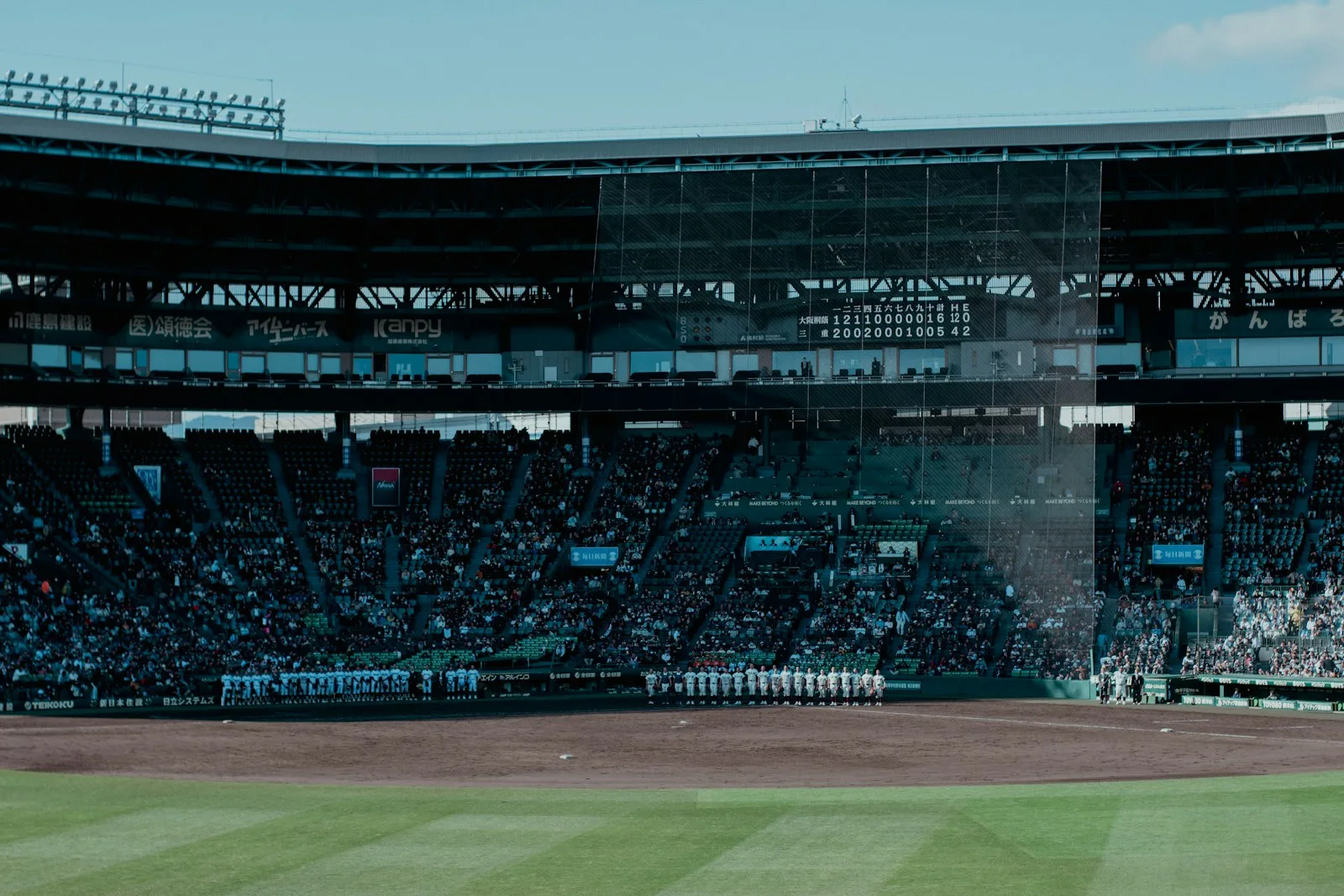 Crowded baseball stadium with a view of the field