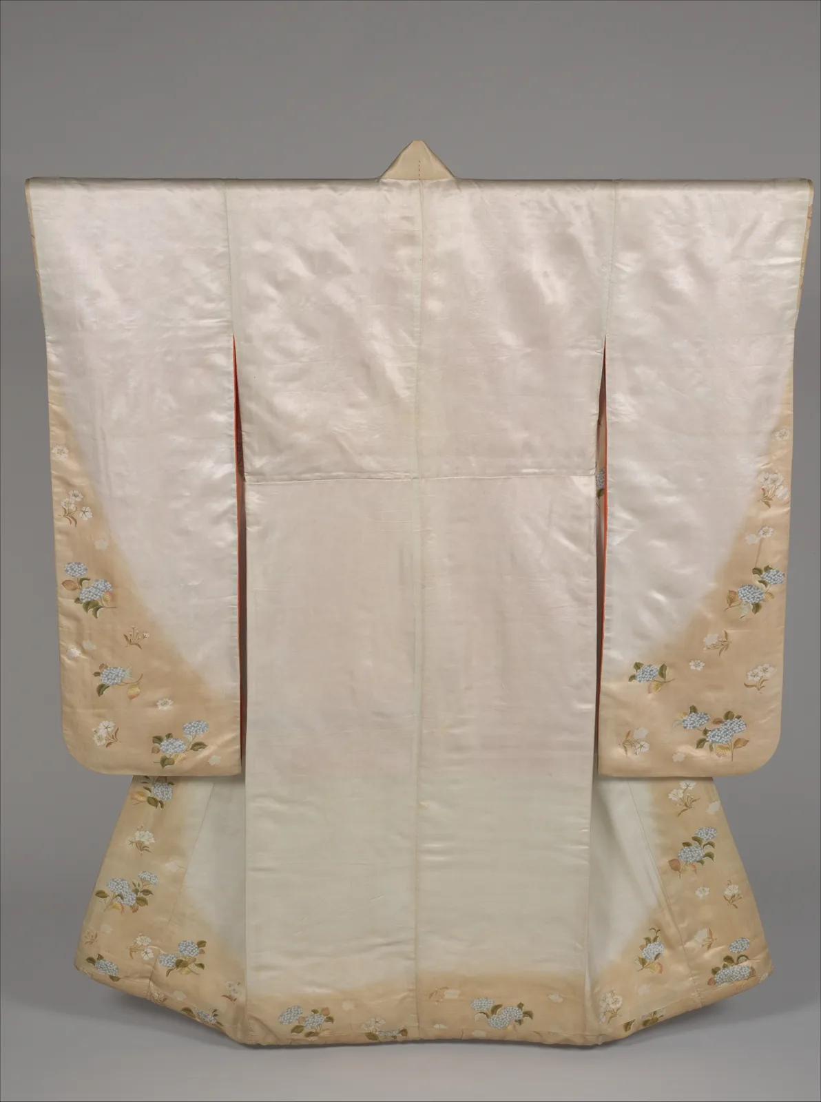 A long-sleeved silk kimono with hand-dyed hydrangeas and cherry blossoms