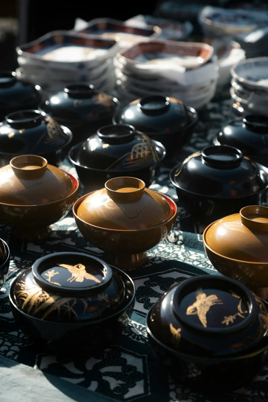Collection of japanese lacquered bowls with lids