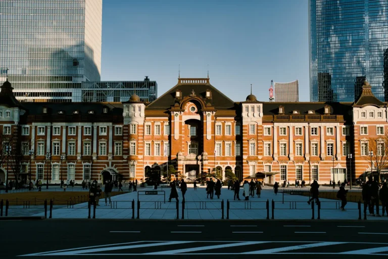 a group of people standing in front of a building