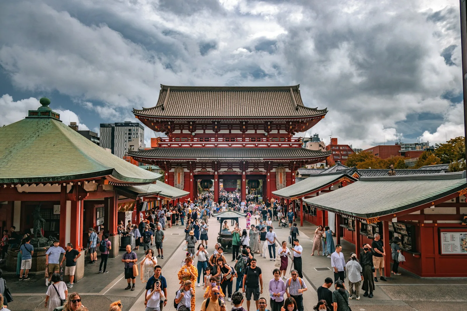 A group of people standing around a building
